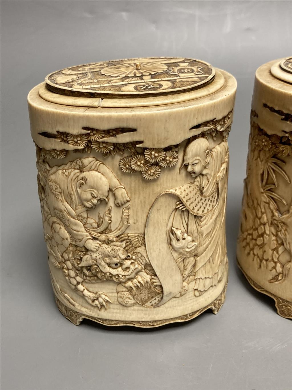 A pair of 19th century Chinese finely carved ivory lidded pots, 12.5cm high and Japanese ceramics